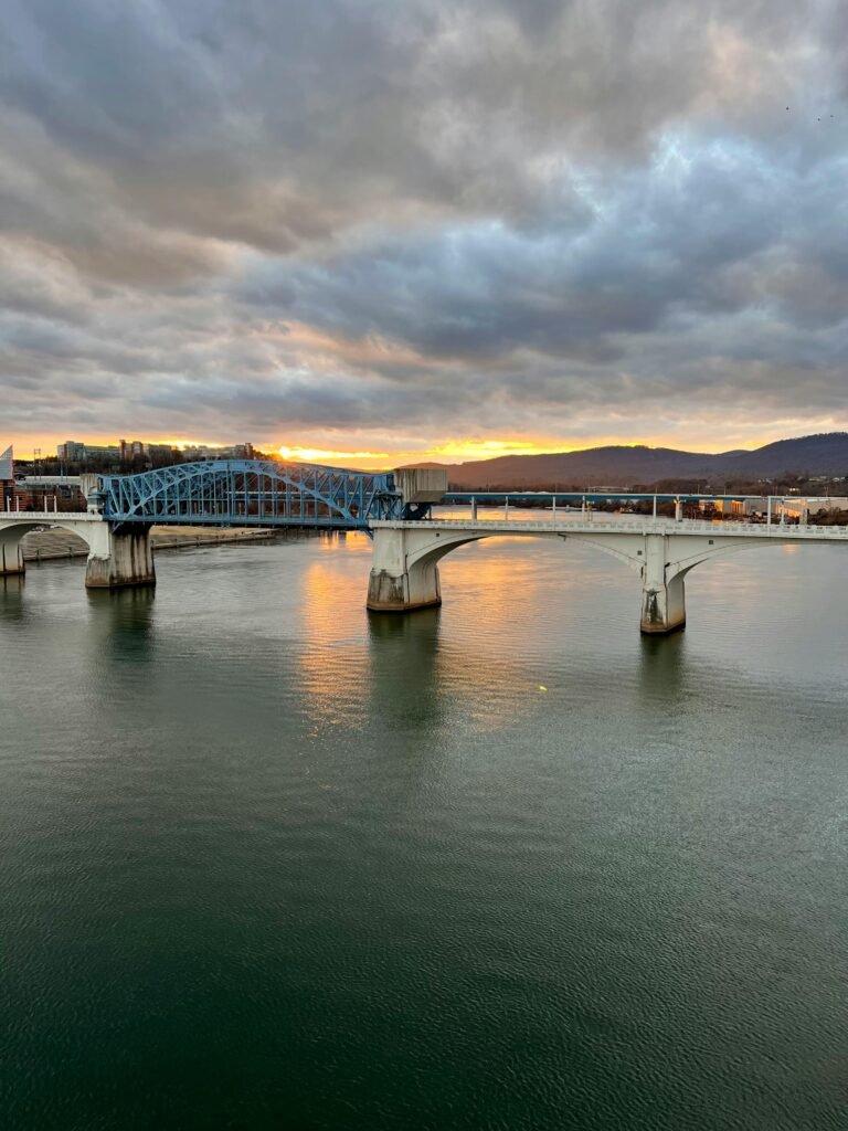 pexels-photo-11947774-11947774 Scenic view of the Walnut Street Bridge in Chattanooga, Tennessee during sunset over the Tennessee River.